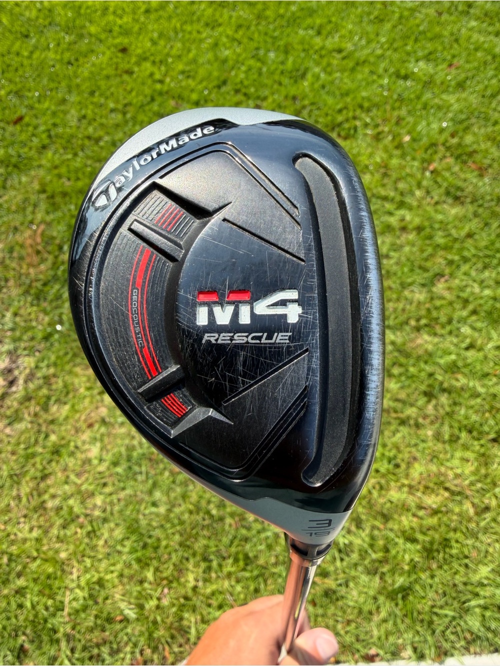 TaylorMade black and red M4 Rescue Hybrid Golf Club